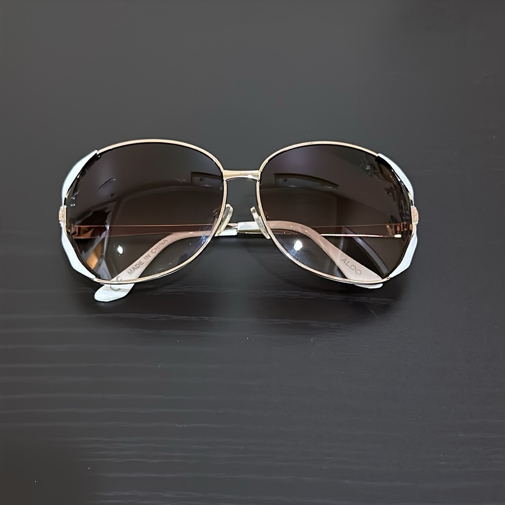 White and gold sunglasses